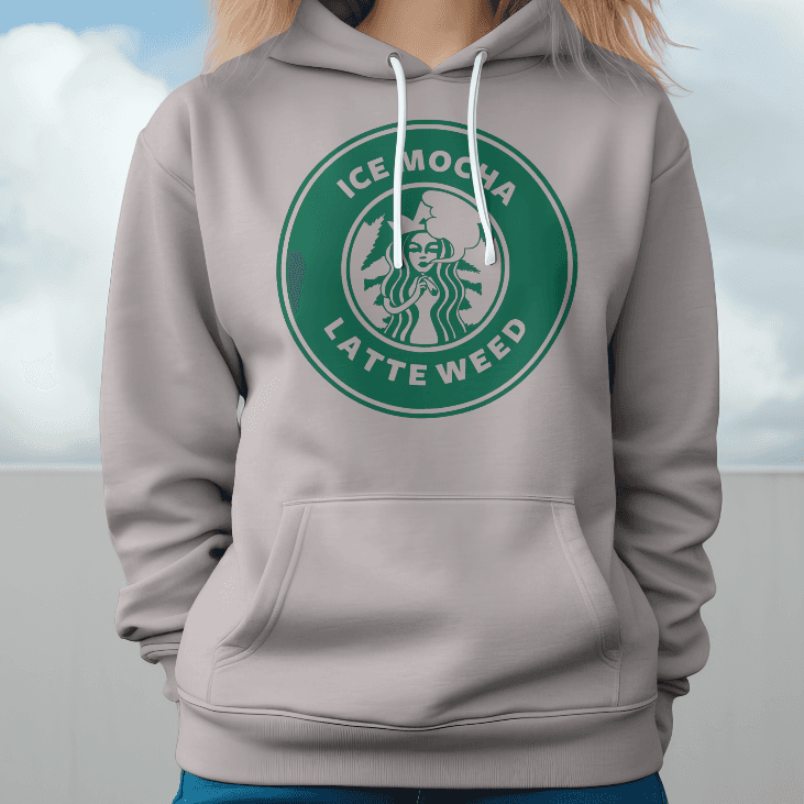 Person wearing a hoodie with a humorous Starbucks logo modification against a cloudy sky.