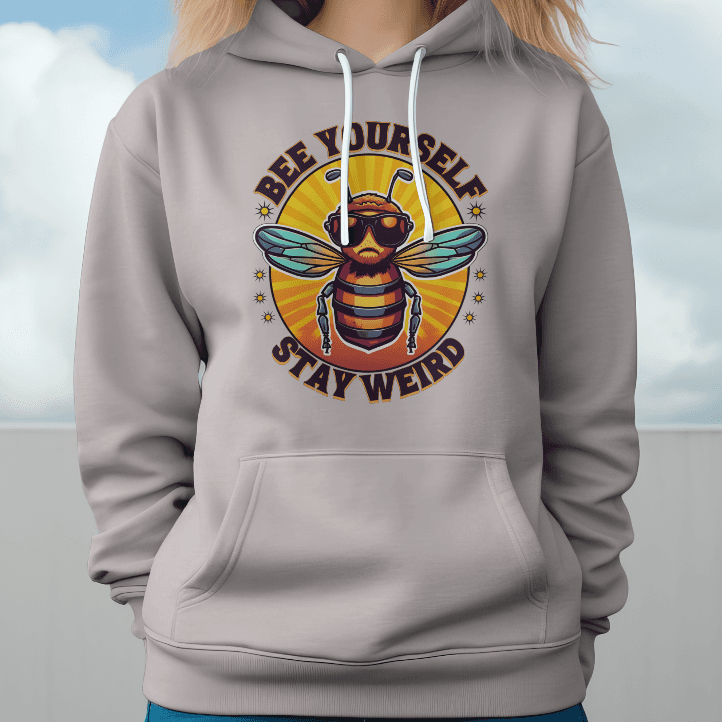 Person wearing a hoodie with a bee graphic and text against a cloudy sky.