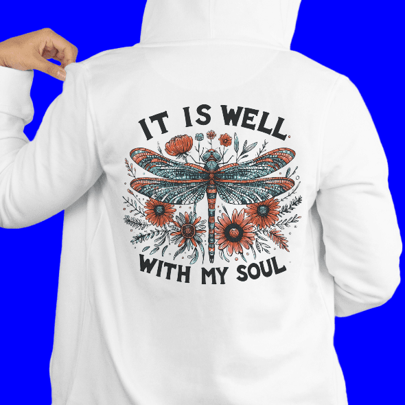 White hoodie with dragonfly design and text on a plain background